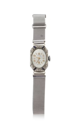 Lot 403 - A white metal and diamond set Imaco ladies...