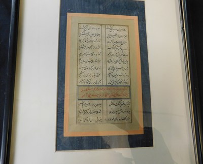 Lot 635 - Arabic manuscript written in black and red...