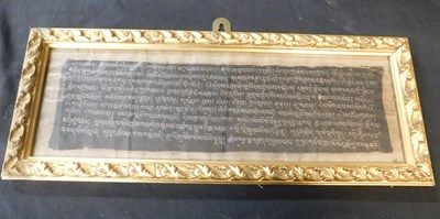 Lot 640 - A Tibetan Buddhist Sutra manuscript page with...
