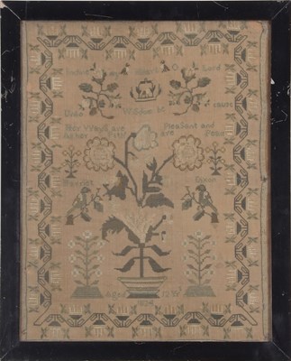Lot 475 - A Georgian needlework sampler decorated with...
