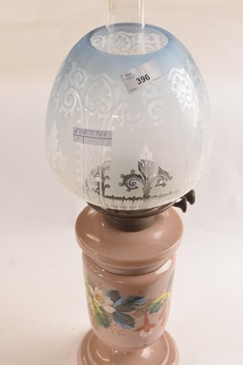 Lot 396 - A 19th Century oil lamp, the glass body...