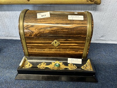 Lot 417 - A Victorian coramandel/brass mounted dome top...