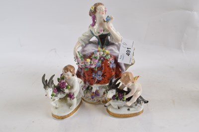 Lot 491 - A continental porcelain figure of a flower...