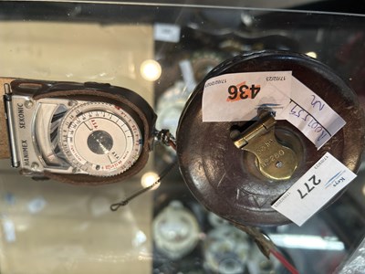 Lot 277 - Rabone leather tape measure with brass winder...