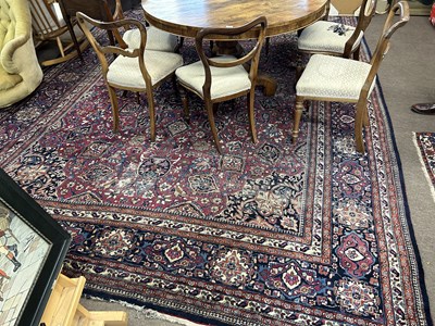 Lot 624 - A 20th Century Heriz wool floor rug, 405 x 305cm