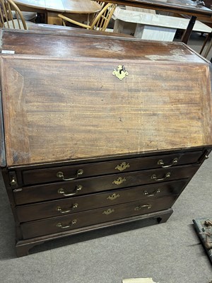 Lot 628 - A Georgian mahogany bureau of typical form...