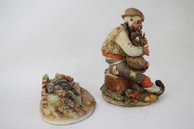 Lot 138 - Two Italian porcelain figures of elderly...