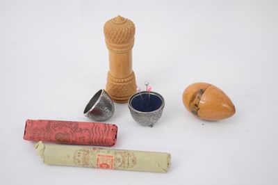 Lot 187 - Small plastic bag containing wooden egg shaped...