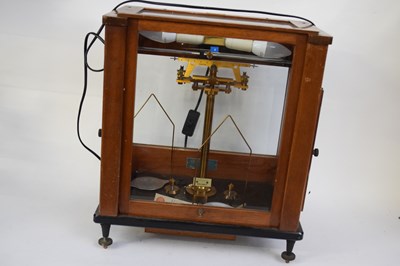 Lot 246 - Cased chemists precision scales bearing label...