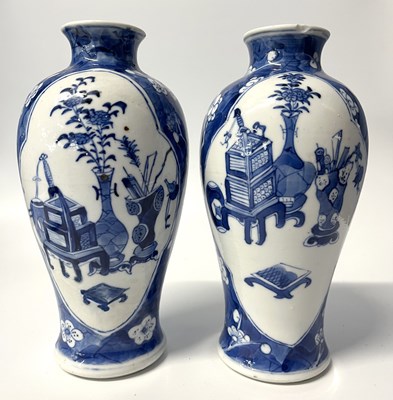 Lot 310 - A pair of small Chinese porcelain vases in...