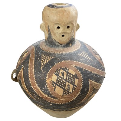 Lot 329 - A Chinese terracotta funeral jar possiby...