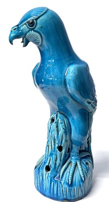 Lot 338 - A Chinese pottery model of a hawk with...