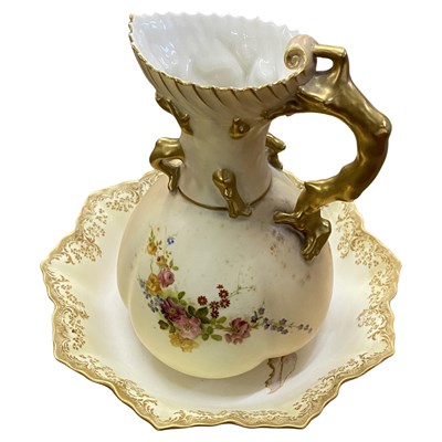 Lot 349 - A Royal Worcester blush ground jug of lobed...
