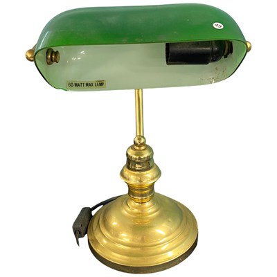 Lot 394 - A brass based bankers lamp with green glass shade