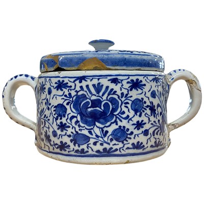 Lot 469 - 18th Century delft possett pot and cover