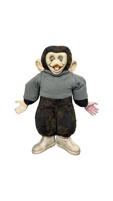 Lot 366 - A mid 20th century straw-filled chimpanzee toy,...