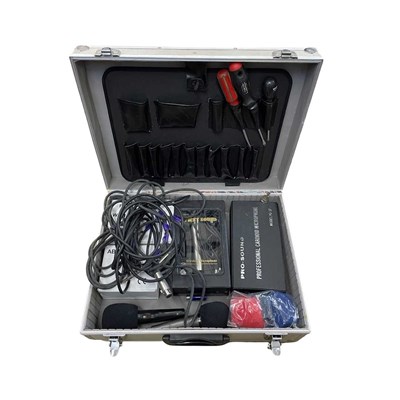 Lot 242 - A silver flight case containing various...