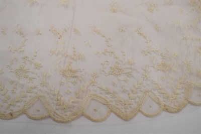 Lot 175 - A mid 19th century Coggeshall lace shawl, the...