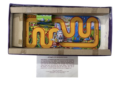 Lot 96 - A boxed Indian-made reproduction tin-plate...