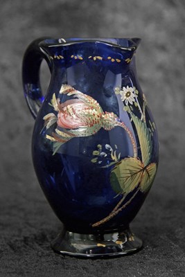 Lot 10 - A rare Newcastle blue glass cream jug...