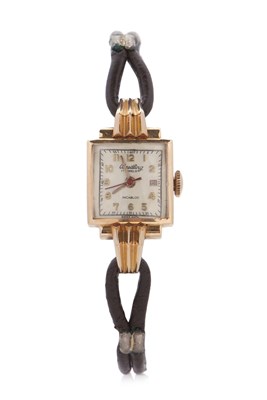 Lot 326 - A yellow metal ladies Breitling wristwatch,...