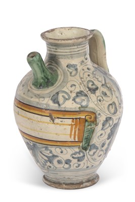 Lot 91 - An Italian Maiolica syrup jar with typical...