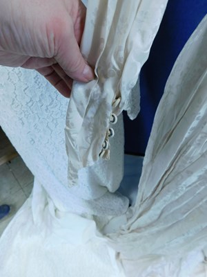 Lot 84 - Two mid 20th Century wedding dresses, one...