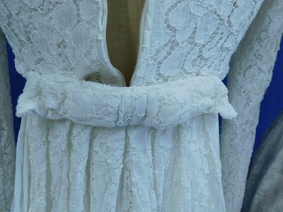 Lot 84 - Two mid 20th Century wedding dresses, one...